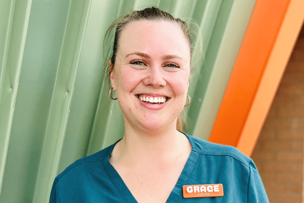 Portrait photo of Dr Grace Wagon standing in front of building at Caboolture Hospital