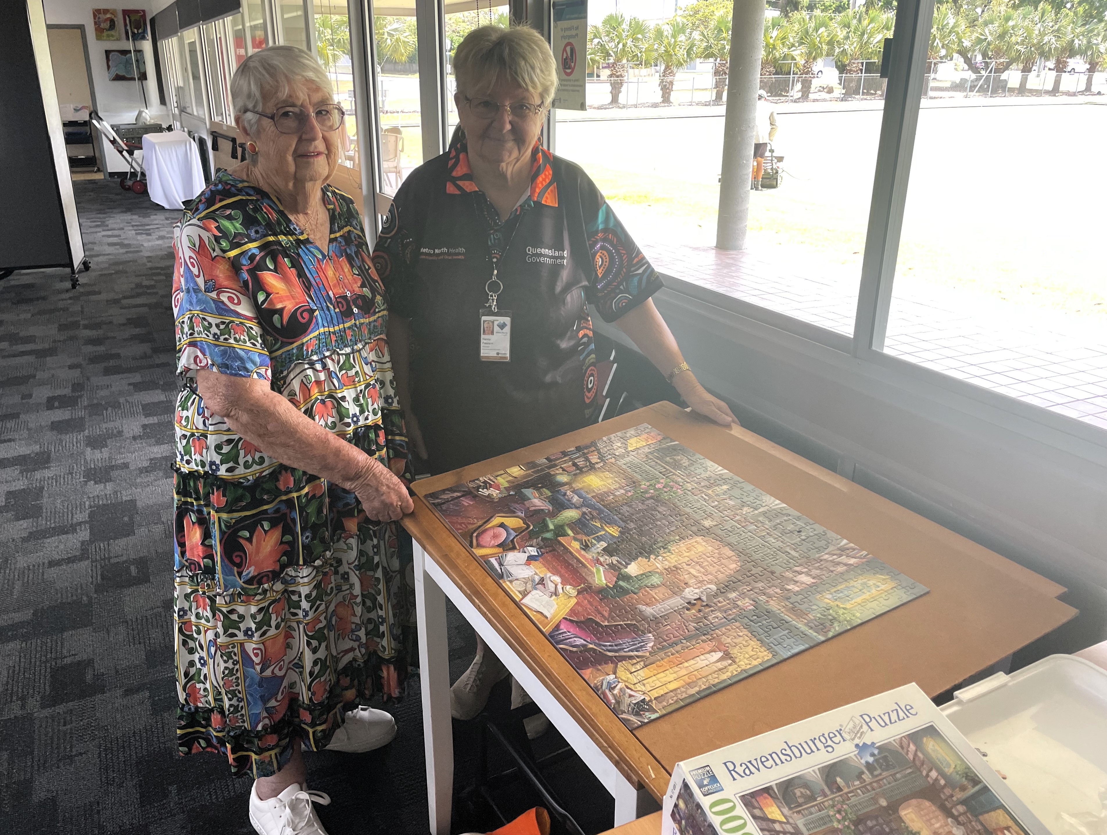 Jackie and Nancy with their completed puzzle