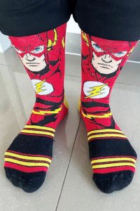 Liz Rushbrook wearing superhero socks for Crazy Socks 4 Docs Day