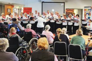 The UA3 Pine Rivers 'Sophisticated Folk' choir performing for Gannet House residents and Zillmere patients 