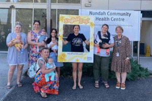 Nundah Community Health Centre staff on Daffodil Day with group of patients
