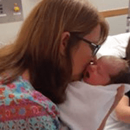 Janine O'Keefe holding one of her grandbabies at Caboolture Hospital