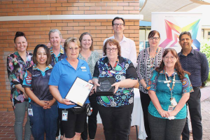 Chermside Post Acute Care Services staff with Dual Shining Star Award