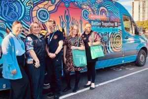 Better Together Health Van with staff standing in front