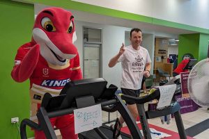 Reece Crawford running a treadmill marathon