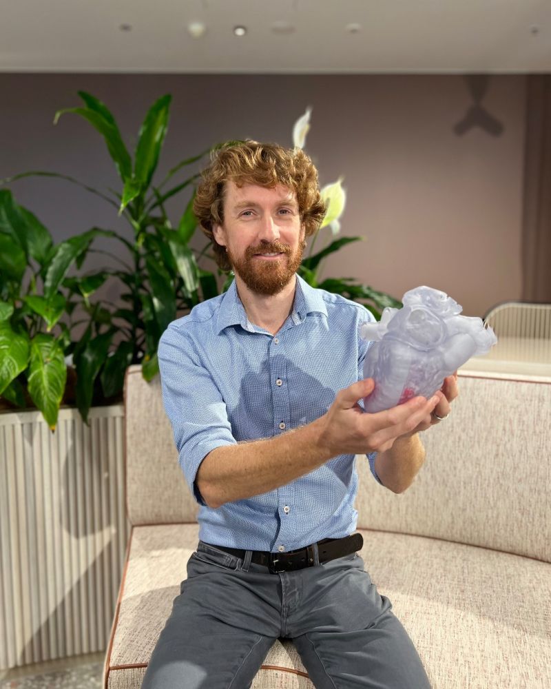 Man holding 3D printed heart