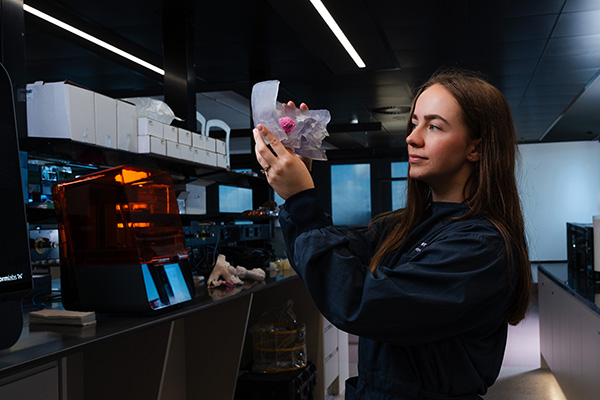 Woman in lab viewing materials