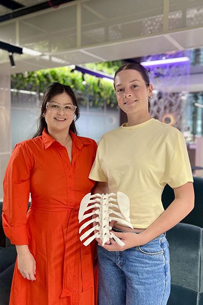 Female student with HBI staff member