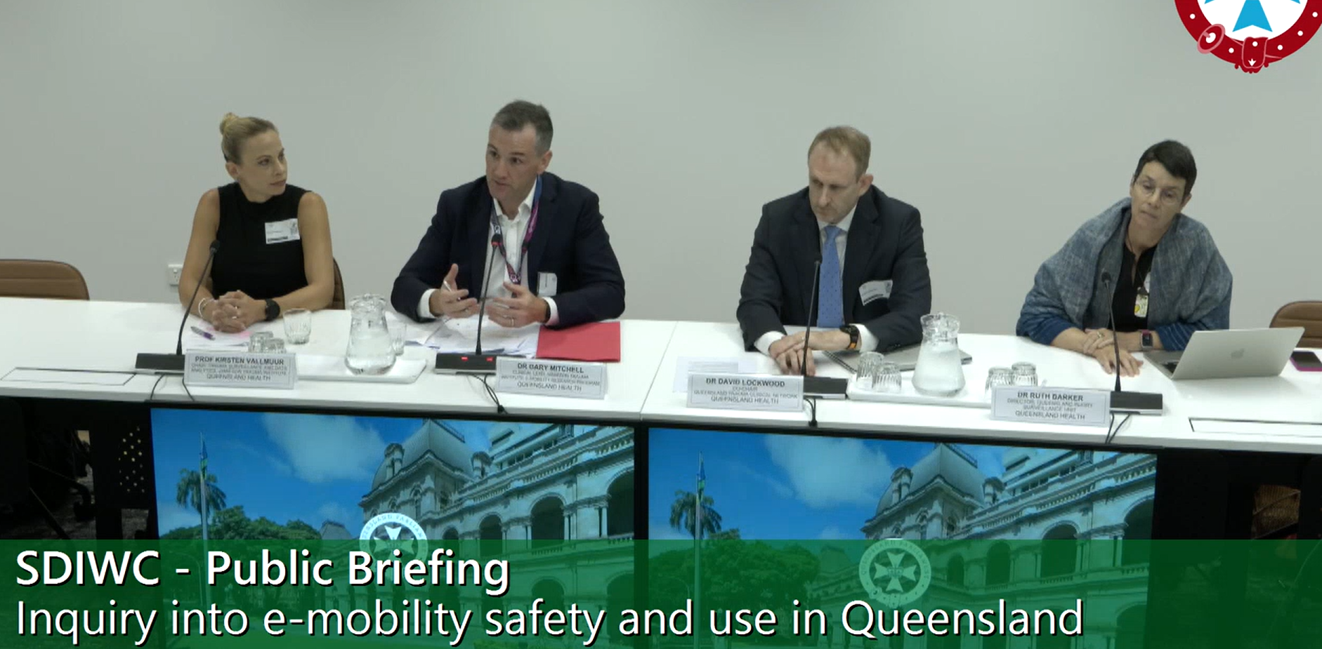 Prof Kirsten Vallmuur, Dr Gary Mitchell, Dr David Lockwood and Dr Ruth Barker at Parliament House, discussing the ongoing personal and health system burden of e-mobility in Queensland.