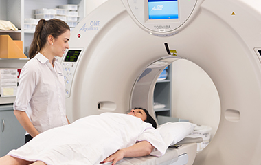 Patient being scanned by MRI