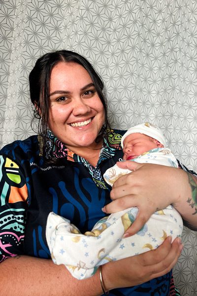 Ngarrama Redcliffe Aboriginal and Torres Strait Islander Health Worker, Angel Sellars, pictured with a newborn.