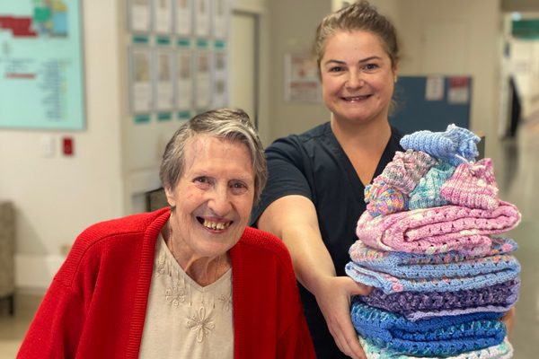 Shelia Smith with granddaughter in-law Laura, and her handcrafted donation