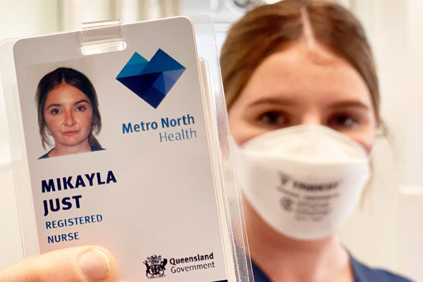 Graduate Nurse Mikayla with new-look ID Card