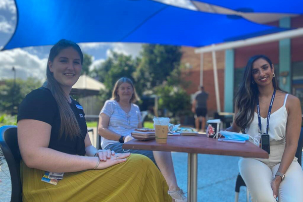 Sam Atkins, Lyn Bridge and Ambi Sud from TPCH's EOC team catching up for a coffee under the new shade sail.