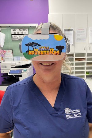 Paediatric Unit Nurse Unit Manager Michelle Hutch testing the VR device