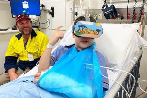 Young patient wearing virtual reality device