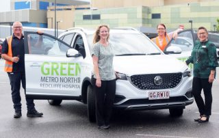 Metro North Health staff with Queensland Health’s first zero emissions vehicle