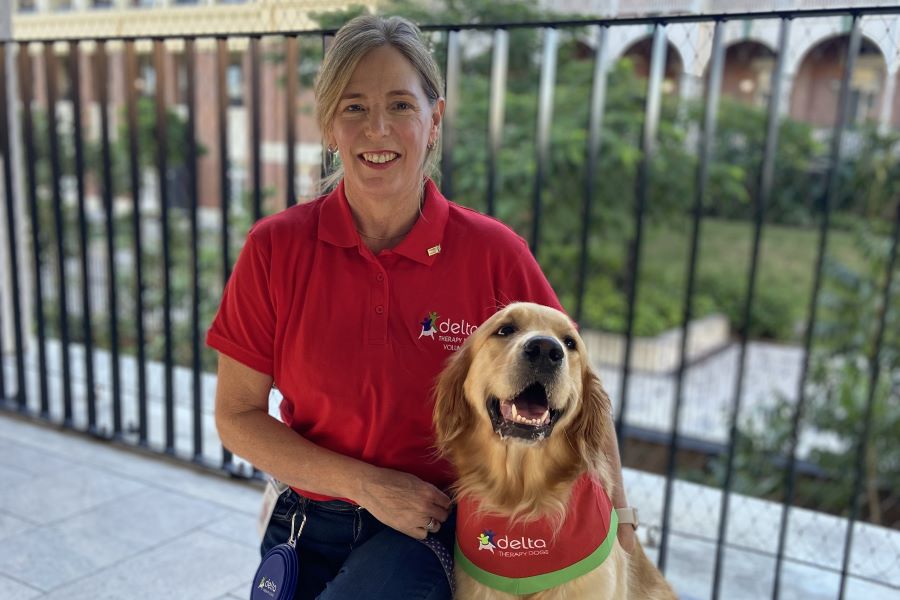 Delta Therapy Dog Olive with her guardian Rosie.