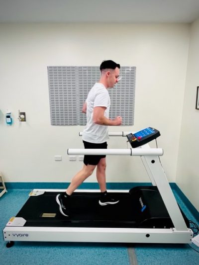 Person on treadmill with monitors