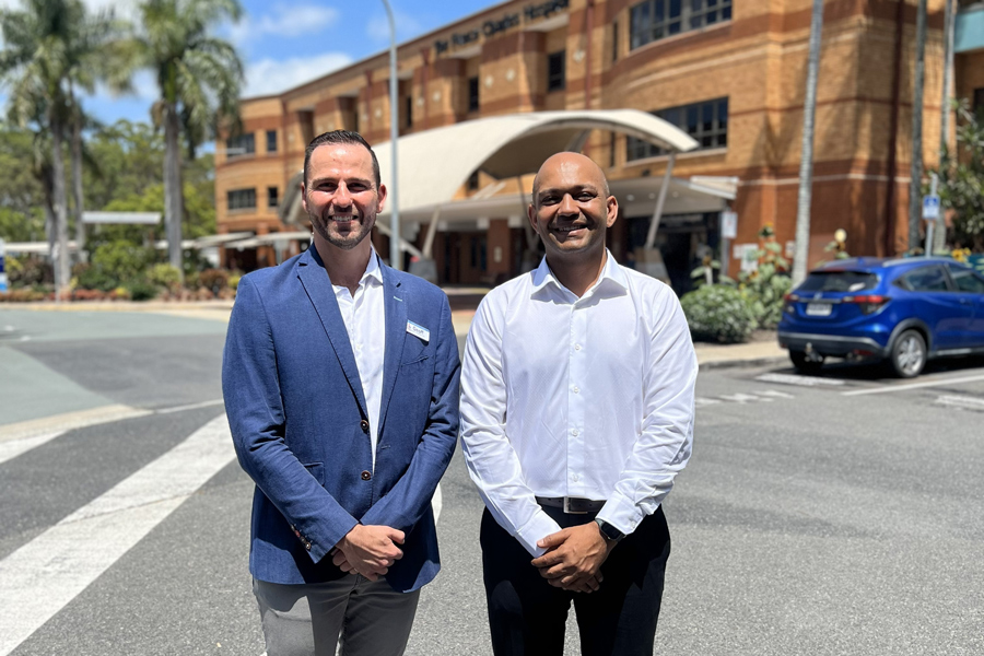 The Prince Charles Hospital Director of Operations Geoff Grima with Anglicare Chief Operating Officer Aged and Community Services Kane Singh celebrating the innovative aged care partnership.