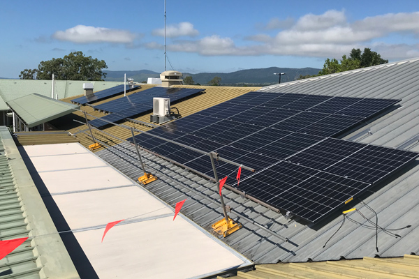 Solar panels being installed at Kilcoy Hospital.