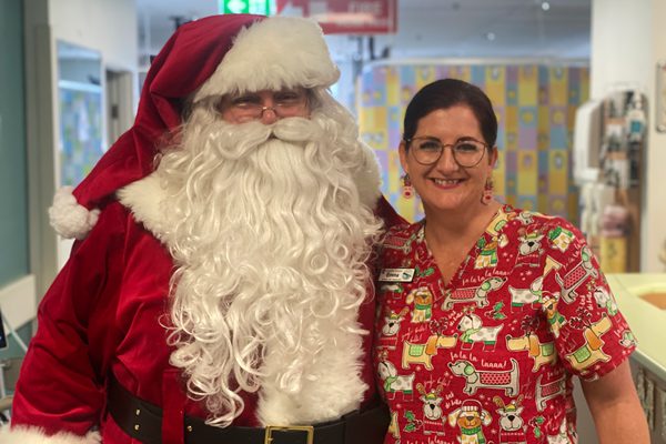 Paediatrics NUM Emma welcomes Santa to the ward.