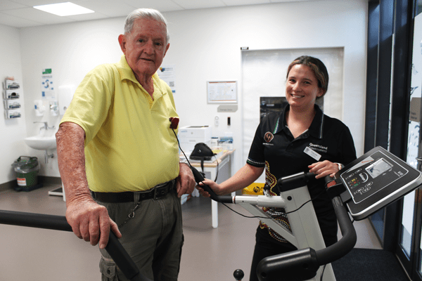Elderly Kallangur resident Andy Byrne has benefited from a new rehabilitation service in Moreton Bay following his heart surgery. Andy is pictured here with HAART Physiotherapist Pascale Goldberg.