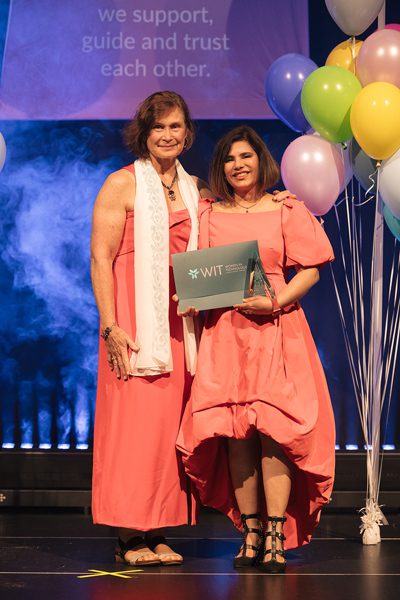 Associate Professor Alka Kothari (right) receiving her Women in Technology Award from QUT's Dr Bernadette Hyland-Wood.