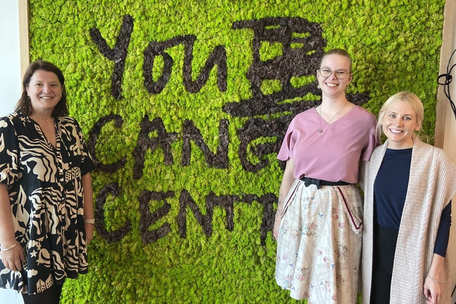 Janine Deevy (left) and Amanda Mellow (far right) from the RBWH Cancer Care team lead YCMSN for Metro North. Pictured with band member, Ainslie.