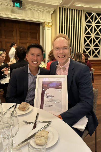 Dr Joel Dulhunty with Redcliffe Hospital Executive Director, Cang Dang, at the award ceremony.
