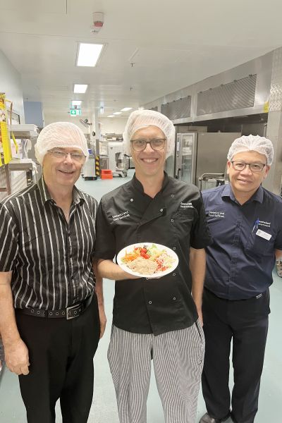 RBWH Consumer Representative Dale, Quality Improvement Cook Scott and Site Coordinator Erwin with the new salmon salad.