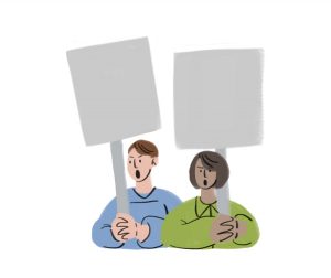 Two people shouting and holding angry signs