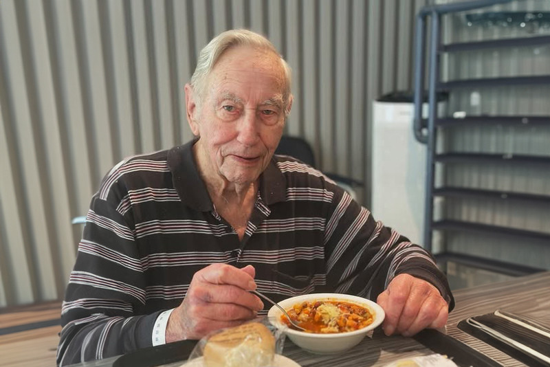 STARS patient Lothar enjoying Gina's hearty minestrone soup as part of a new 'meet the staff and their favourite dish' initiative.