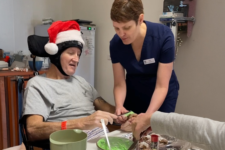 STARS patients making Christmas gingerbread biscuits and a gingerbread house as a part of their occupational therapy