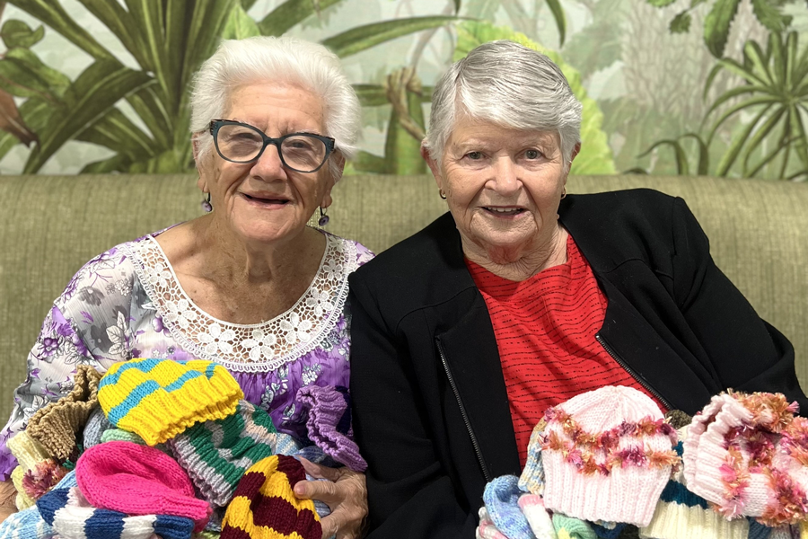 Di and Pat pictured with some of the many beanies they delivered to RBWH maternity.